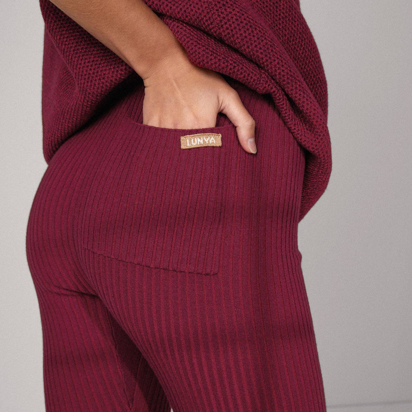LUNYA's full-length Cozy Cotton Silk Ribbed Leggings in burgundy, available at LaSource in Darien