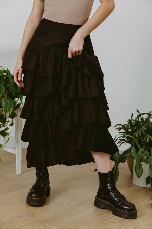 Carolina Benoit - Cascading Ruffles Midi Skirt in black, available at LaSource in Darien