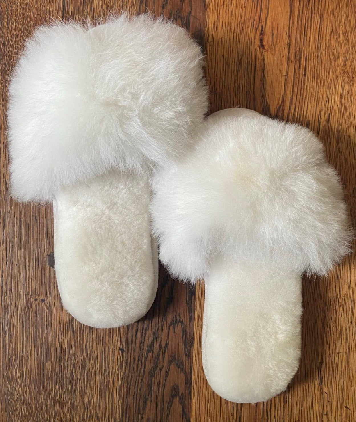 Samantha Holmes Alpaca Fur Slides in ivory, available at LaSource in Darien