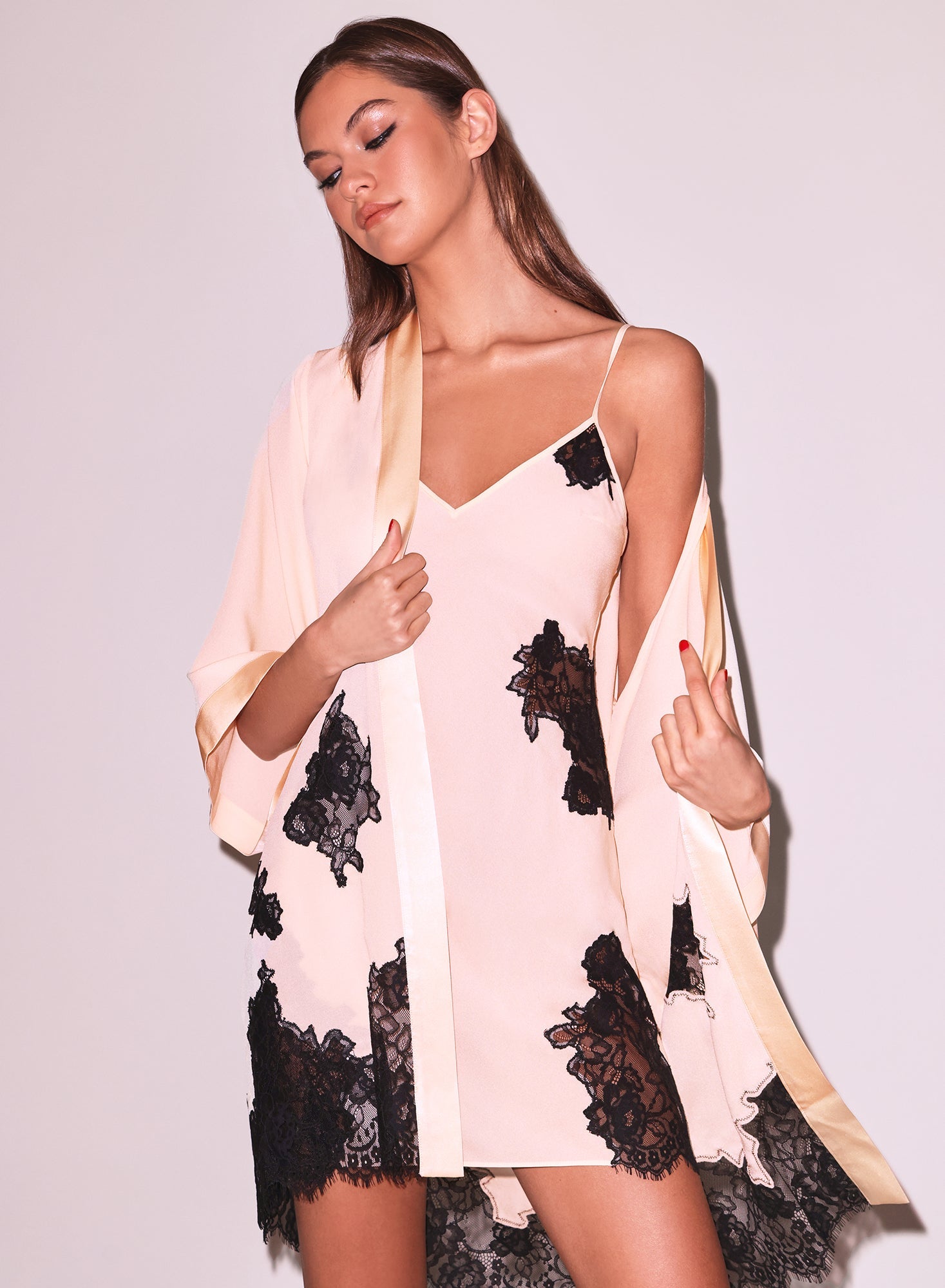 Fleur Du Mal’s Lace Applique Robe in Honey Peach, available at LaSource in Darien and LaSource in New Canaan. 