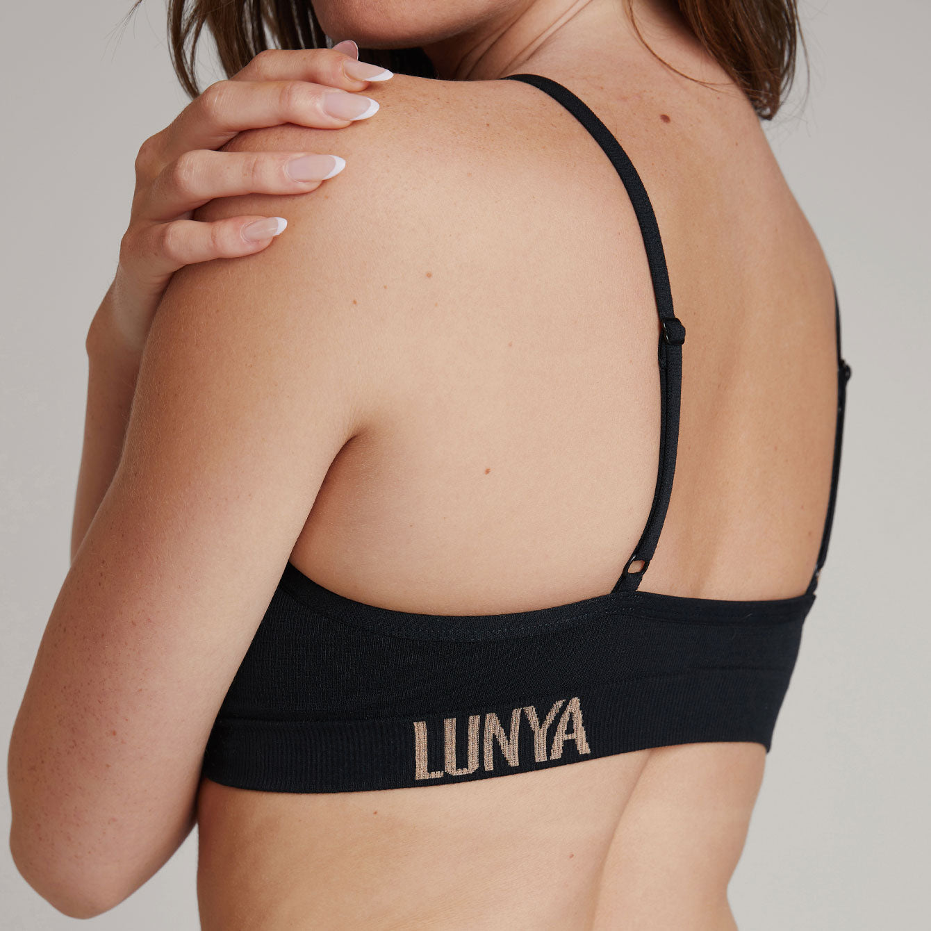 Lunya Seamless Modal Bare Bralette in black, available at LaSource in Darien