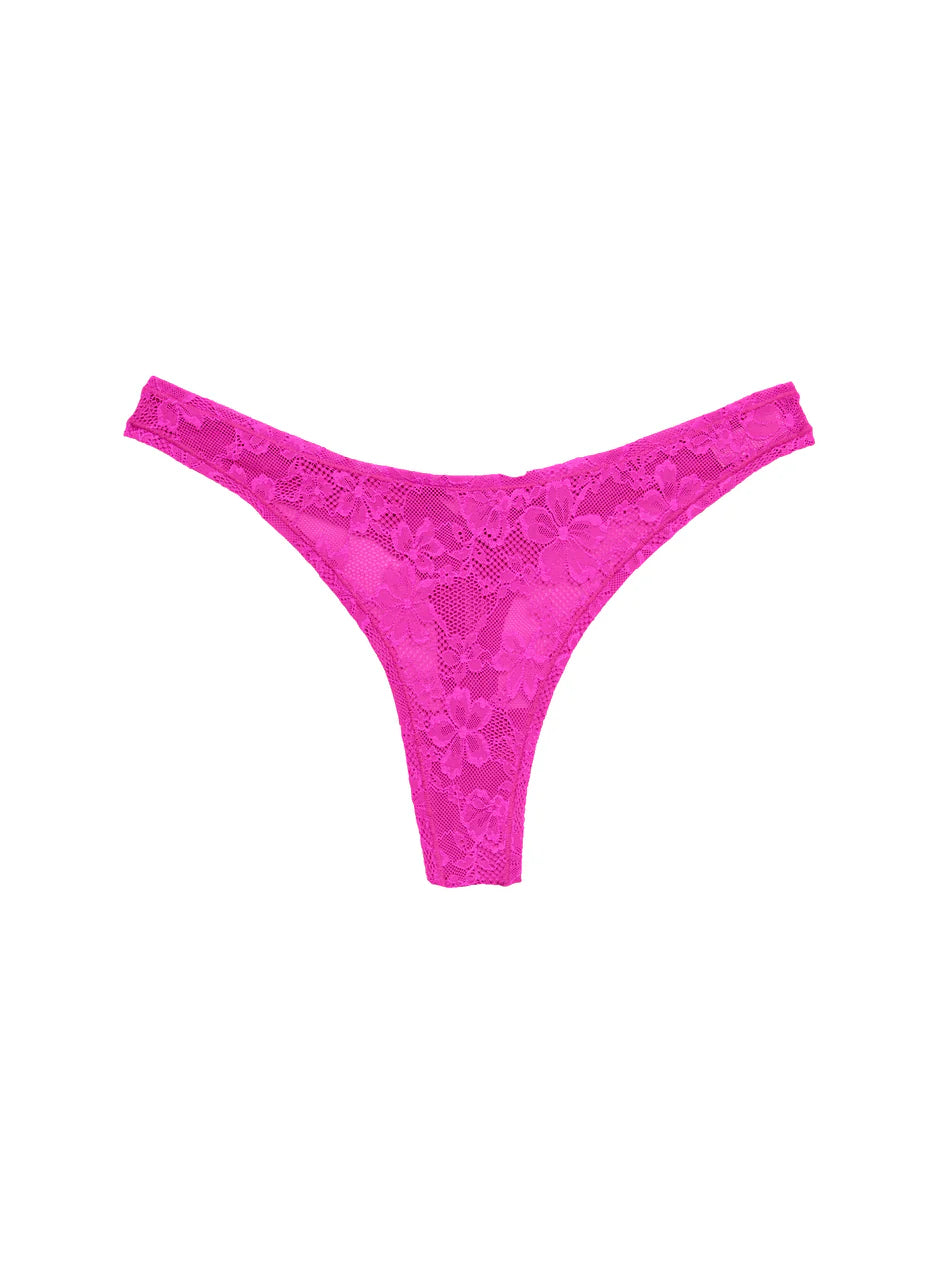 Fleur Du Mal - Le Stretch Multifit Lace Thong in Wild Pink, available at LaSource in Darien