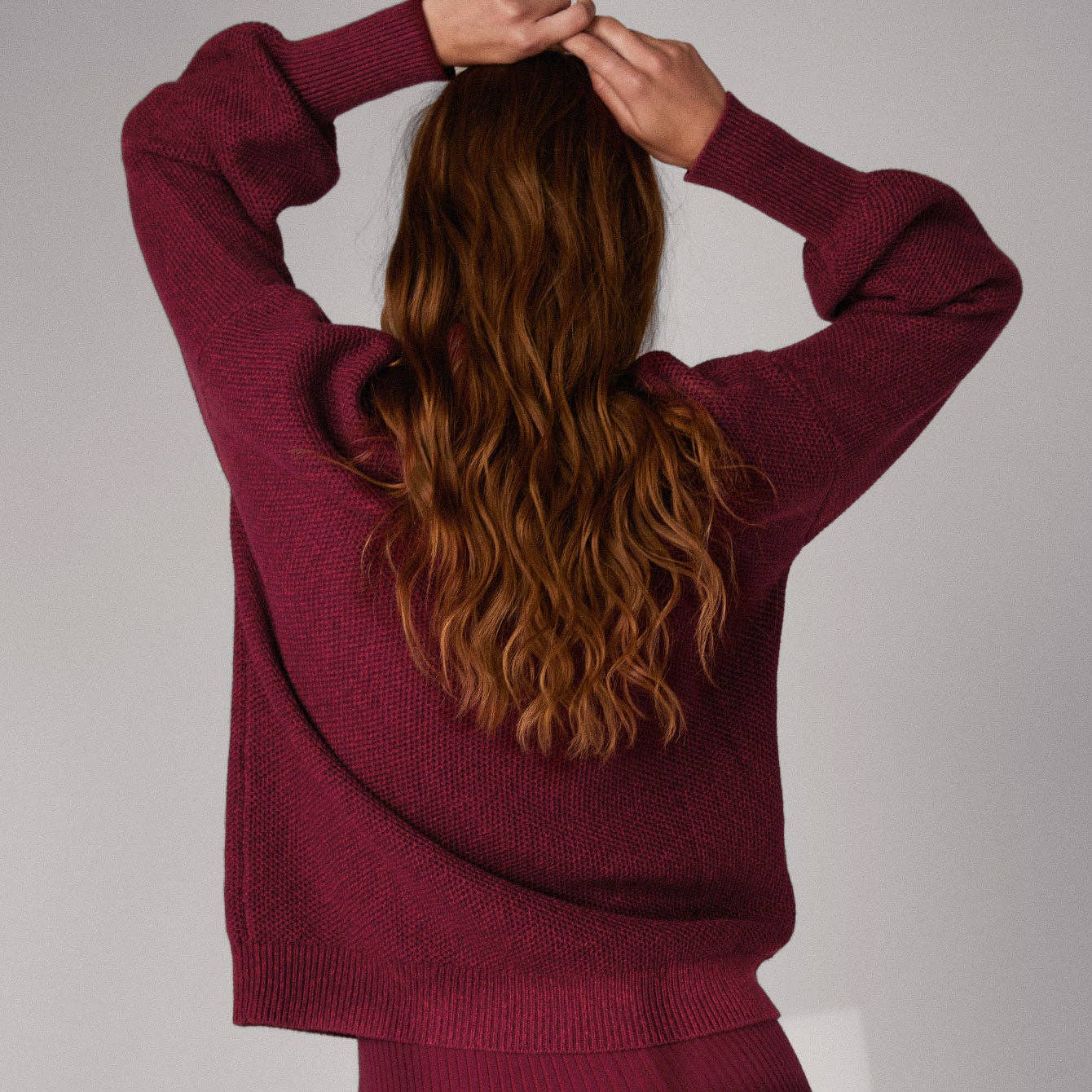 Lunya Cozy Cotton Silk Pocket Henley in Madrone Burgundy Marl, available at LaSource in Darien