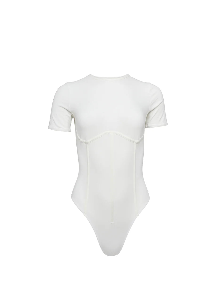 Fleur Du Mal - Organic Cotton T-shirt Bodysuit in ivory, available at LaSource in Darien