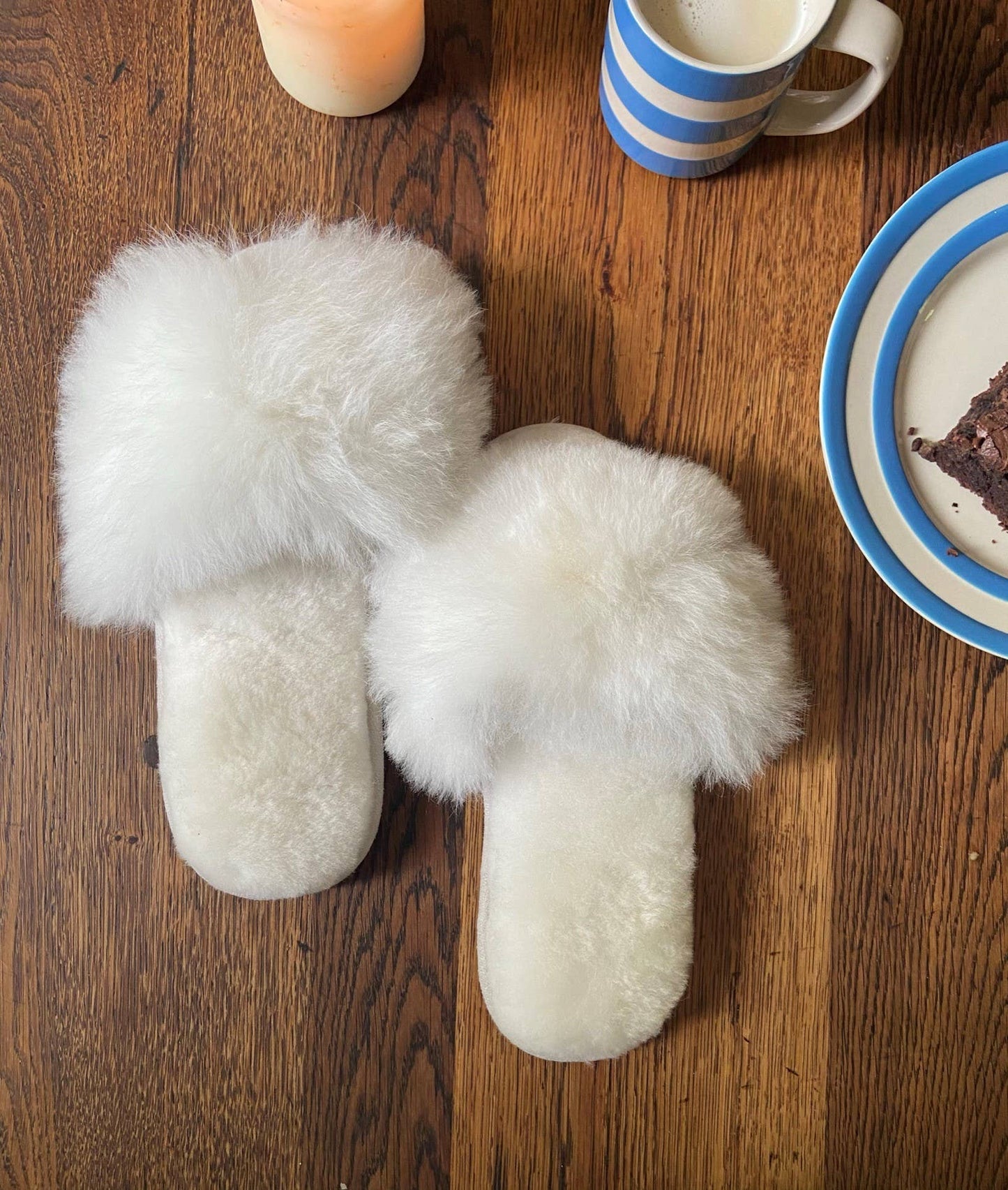 Samantha Holmes Alpaca Fur Slides in ivory, available at LaSource in Darien